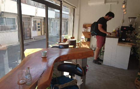 Large wooden table, Othello Coffee